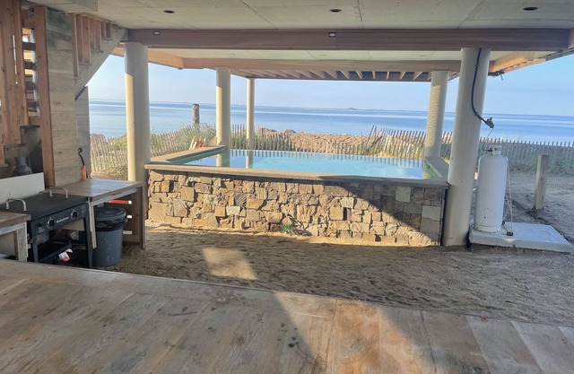 Beachfront home with heated pool