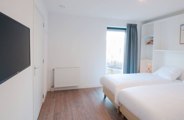 Beautiful apartment in villa for 10 guests with WIFI, hot tub, TV and parking