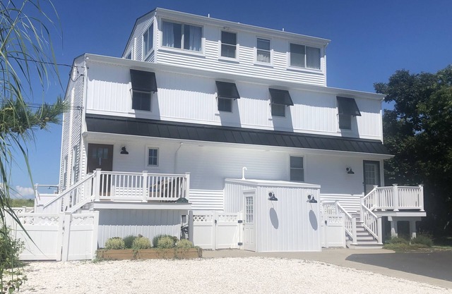 BEAUTIFUL BEACHFRONT TOWNHOUSE WITH BEACH ACCESS AND OCEAN VIEWS STEPS TO BEACH