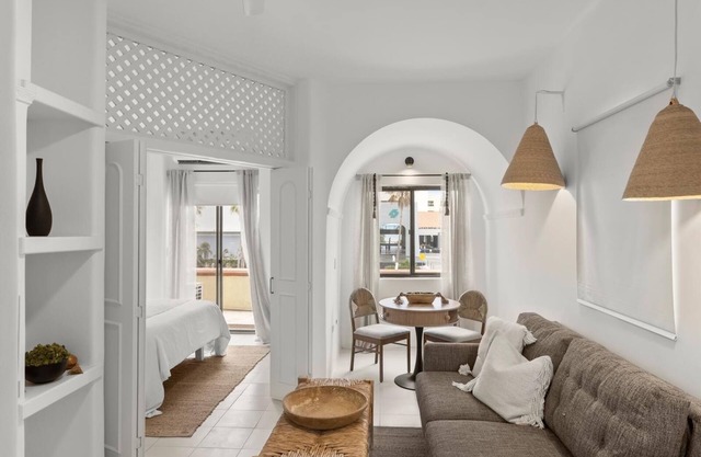 Beautiful designer condo across from beach, shops and restaurants!
