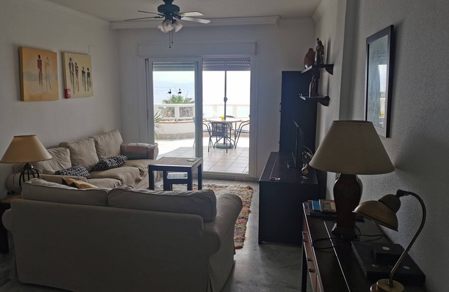 Beautiful holiday ground floor apt with garden, big balcony and shared pool