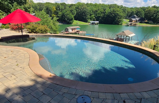 Beautiful lakeside family or corporate retreat with pool, hot tub, and more!