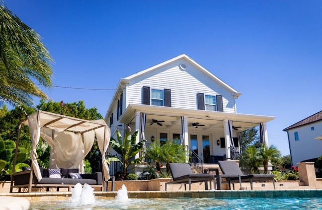 Beautiful large tropical pool in gated yard.