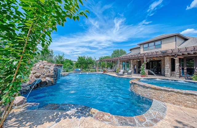 Beautiful oasis in the heart of Katy! Sit poolside or enjoy lakefront access.