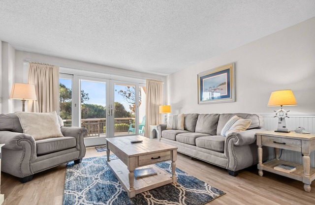 Beautiful oceanfront condo in the heart of Pine Knoll Shores with pool