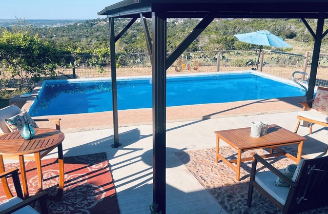 Beautiful view,18 acres,pool, game room,Axis deer, 3 mile’s to the river trail.