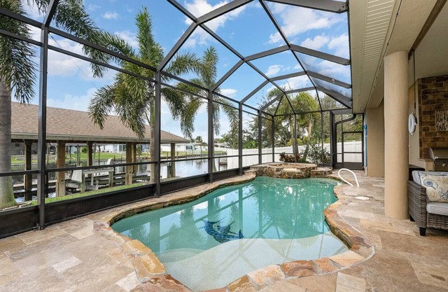 Beautiful waterfront 5 BR home with pool, kayaks