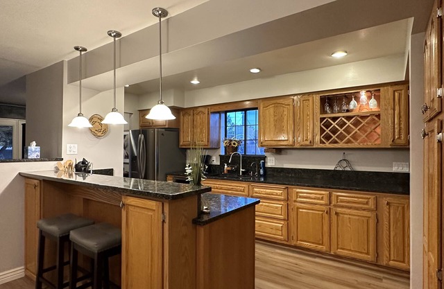 Beautifully updated house with 2 master suites, hot tub & great patio space!