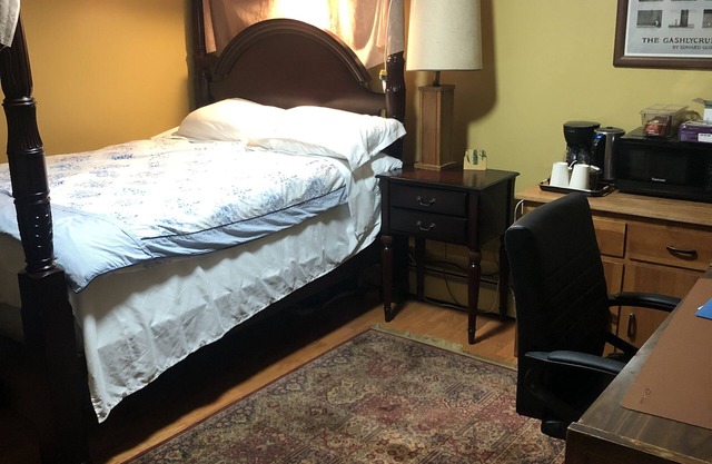 Bedroom with private full bathroom, linen and towels are provided.