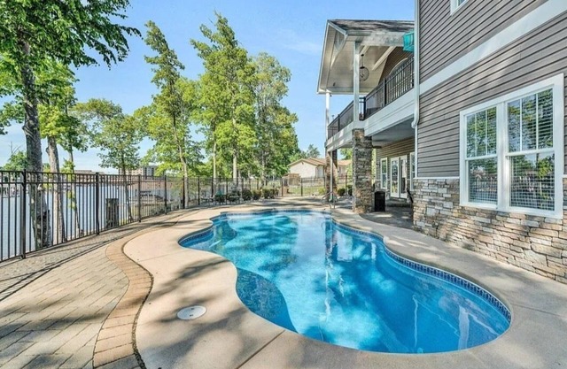 BEST location on Smith Mtn lake! Waterfront home w POOL & Dock in no wake zone.