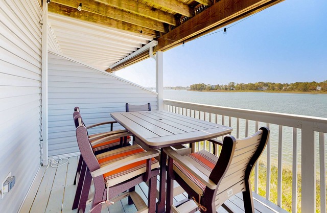 Bethany Marina bayfront condo with pool, fireplace, water views