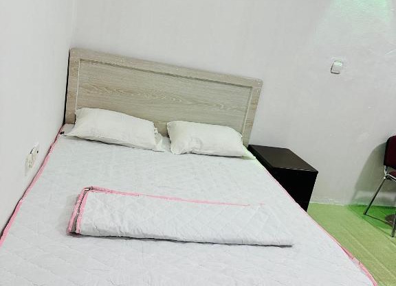 Big bedroom in apartment sharing washroom