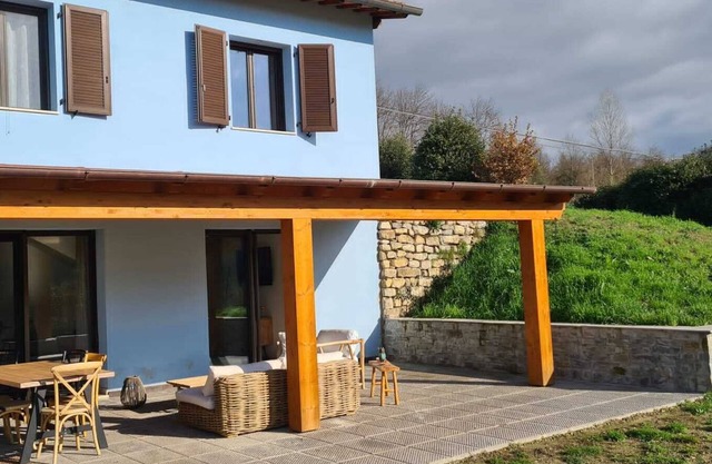 Blue villa surrounded by greenery between Arezzo Florence and Siena