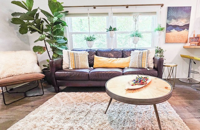 Boho, plant-filled home w/wood + leather touches, 3 beds, 2 baths, super clean.