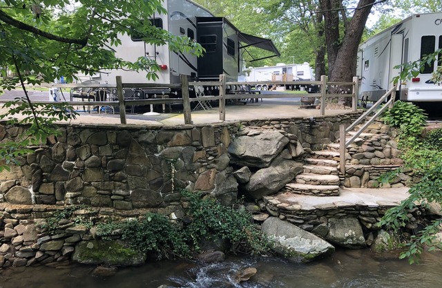 Brand New List! Beautiful RV on Creekfront lot. Amenities galore. Lot 311