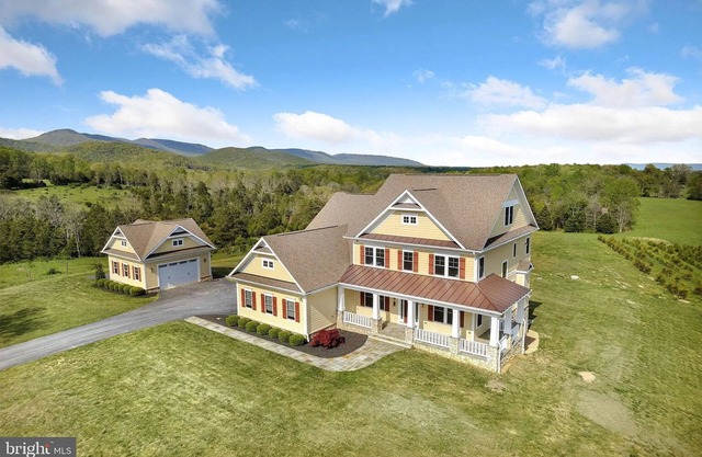 Breathtaking Views Farmhouse Estate on 3 levels w/nearby activities year-round.
