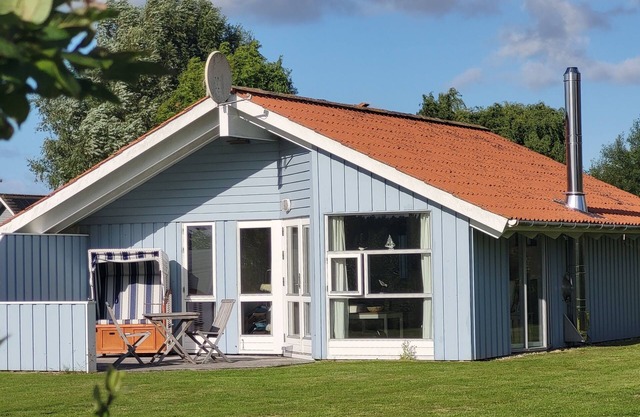 bright Danish timber house with open views to nature, pets welcome