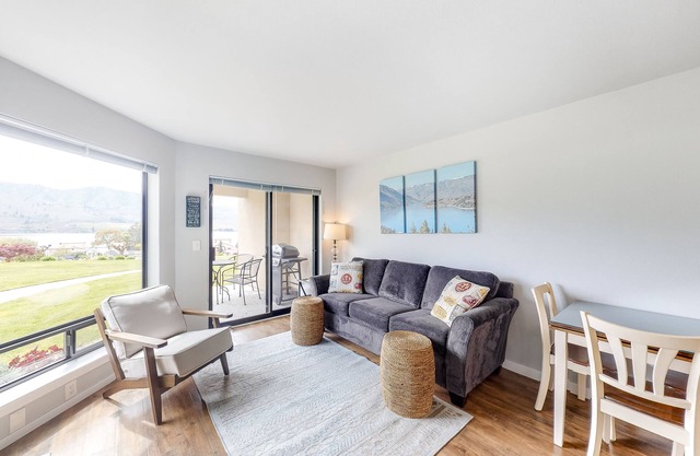 Bright Waterfront Condo with Lake & Mountain Views, Shared Pools & Hot Tubs