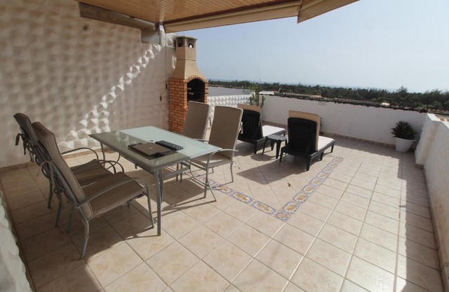 Bungalow con terraza vista al mar