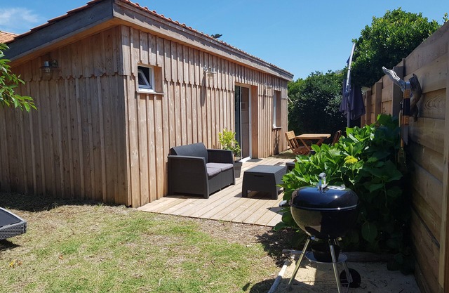Cabanon at the foot of the dunes of the beach horizon CAP FERRET