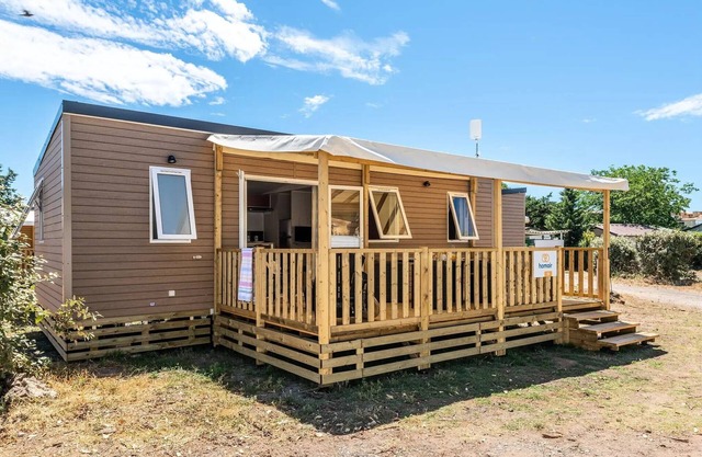 Campsite La Pinède* - Mobile home Premium 4 rooms 6 people air-conditioned - TV