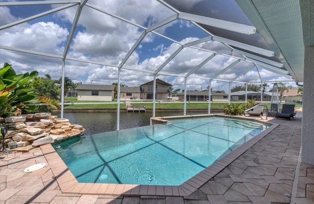 Cape Coral 3-Bedroom Canalfront Pool Vacation Home with Dock