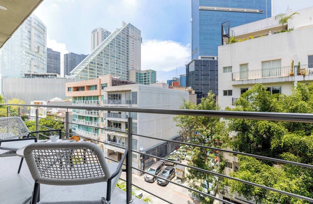 Capitalia | Chic 2BR + Rooftop & Valet Parking
