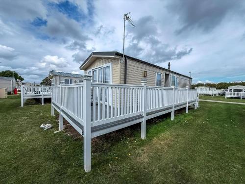 Caravan With Large Decking At Coopers Beach Holiday Park Ref 49012Sv