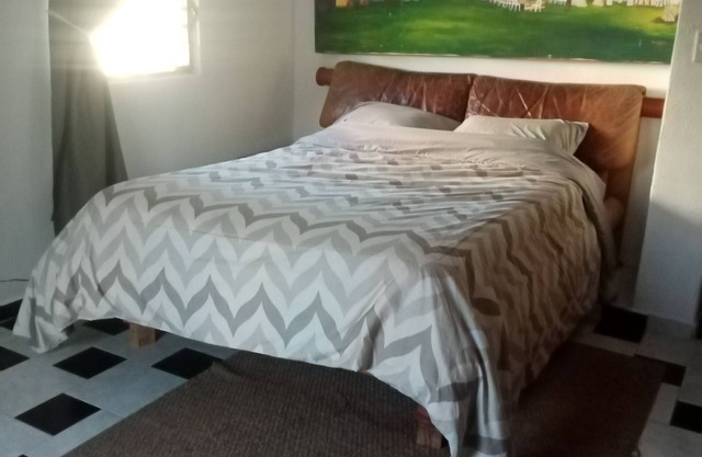 Caribbean Room in the 2nd floor of a House. The HOST lives in the 1rst floor