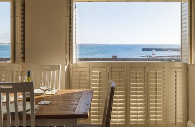 Carrick Bay is a ground floor apartment and enjoys spectacular views of Port St Mary Bay and beyond.
