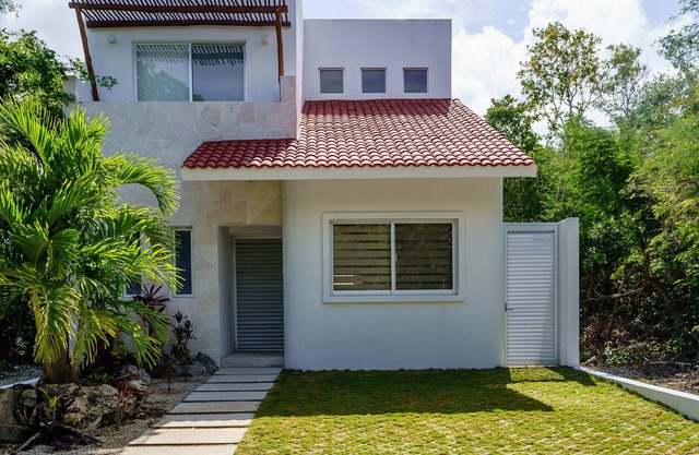 Casa Barbara is a peaceful setting, abundance of vegetation in the gated community of Aldea K'iin.