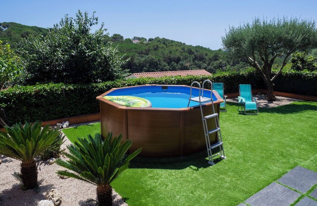 Casa con Jardín y Piscina Cercana al Centro