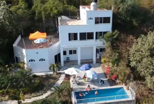Casa rústica en zona dorada Cerca zona hoteles restaurantes y tiendas Casa privada con Muchas habitaciones