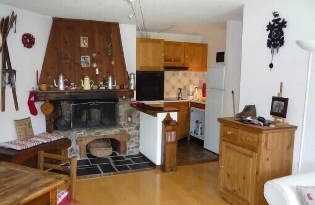 Character apartment with fireplace in residence with summer swimming pool.