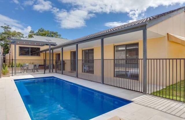 "Charmes" paradise by the shore with a private heated pool. Pet Friendly!