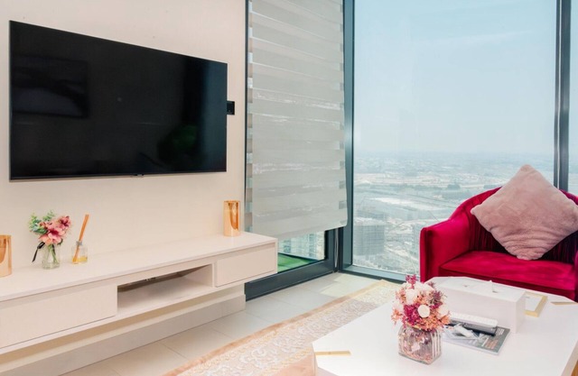 Charming 1BR Apt in Sobha Waves with Infinity Pool