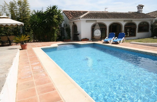 Charming detached villa with private pool and lawned gardens