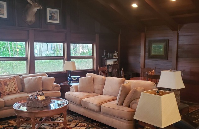 Charming family-friendly Lake Martin 4-bedroom/4-bath cabin beautiful on point.