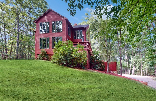 Charming Hillside Retreat with Hot Tub, Firepit, and Spacious Deck