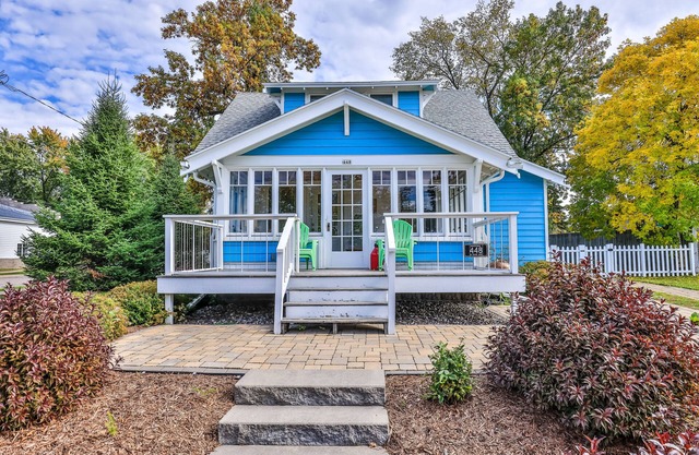 Charming lakefront home with shared dock, porch, & sunroom - walk downtown
