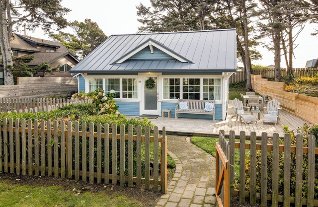 Charming, ocean view cottage near the beach, dog friendly, and situated on a double lot.