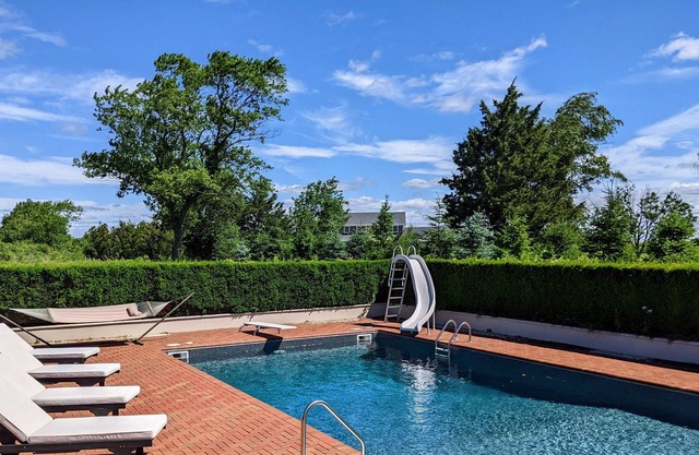 Charming ranch house with pool, steps to beach