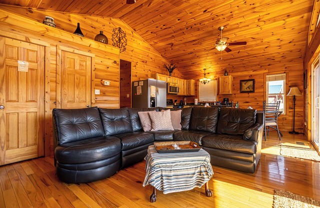 Charming riverside with stunning views, cozy interiors, full amenities, and spacious decks.