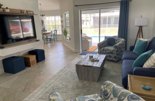 Charming Southwest Cape Coral home with saltwater pool.