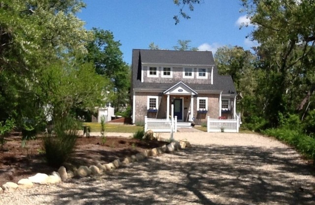 Charming two-storey shingled Cape Cod cottage, off Cape Cod Bay. With priv pond.
