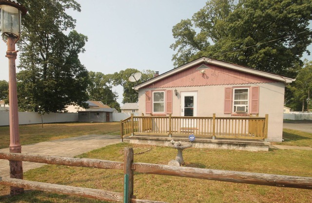 Charming vacation rental is nestled just a few blocks away from the Delaware Bay.