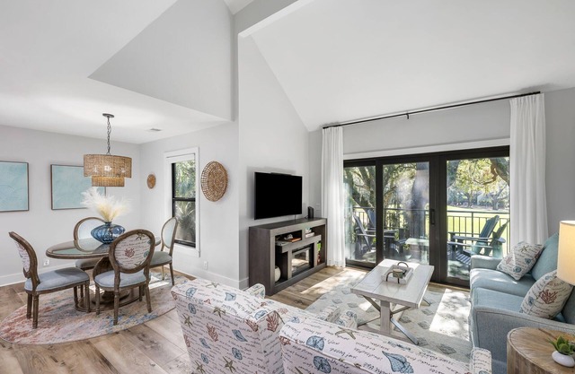 Clean, updated villa half mile to beach. Club access.