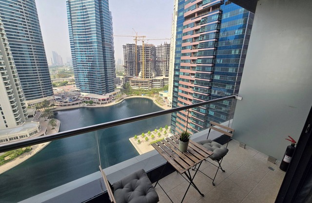 Click Stay - JLT - Entire Studio & Balcony Lakes view Apartment -NA