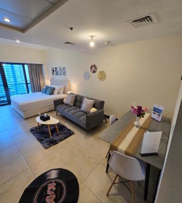 Click Stay - JLT - Entire Studio & Balcony Lakes view Apartment -NA