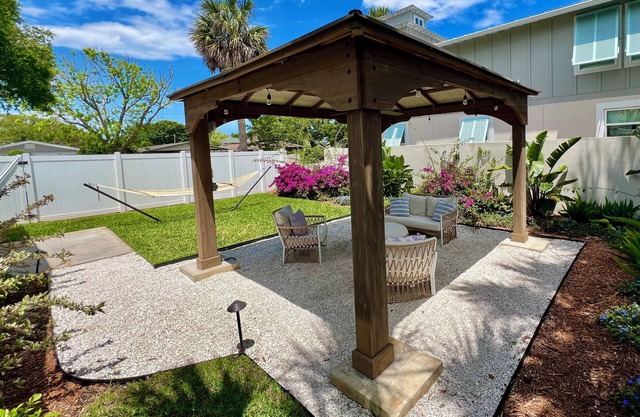 Coastal Hideaway – Walk to Beach, Dog-Friendly w/Gazebo & Gourmet Kitchen!
